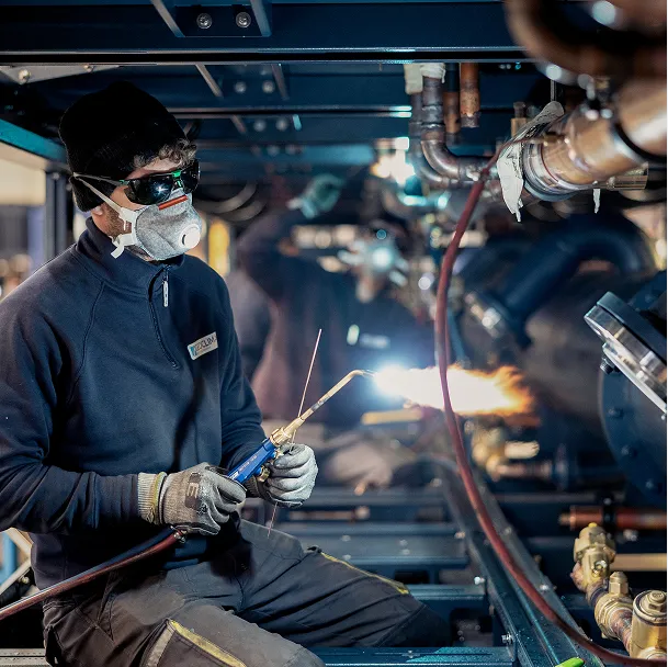 Employee in a Munters manufacturing facility.
